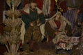 Christmas nativity scene - Jesus Christ, Mary and Joseph. Wooden figurines, donkey in the background Royalty Free Stock Photo