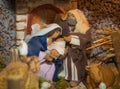 Christmas nativity scene represented with statuettes of Mary, Joseph and baby Jesus Royalty Free Stock Photo