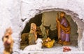 Christmas nativity scene represented with statuettes of Mary, Joseph and baby Jesus Royalty Free Stock Photo
