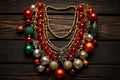 a christmas necklace with red and green ornam