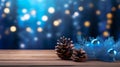 Christmas and New Year background with blue baubles, pine cones and bokeh. Beautiful Christmas card. Royalty Free Stock Photo