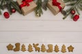 Christmas and New Year background. Composition of gifts, Christmas toys and branches, cones, and holiday cookies with copy space Royalty Free Stock Photo