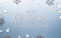 Christmas and new year background concept. Top view of Christmas star and snowflake on pastel blue background