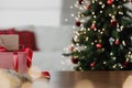 Christmas, New Year background. Empty wooden tabletop with bokeh fir tree, gift Royalty Free Stock Photo