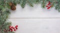 Christmas New Year background with fir tree, pinecone, red berries and snow on a white wooden background. Copy space for your text Royalty Free Stock Photo