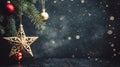 Christmas and New Year background with gold and red Christmas tree decorations and gold stars on a gray background and bokeh Royalty Free Stock Photo