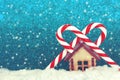 Christmas, New year background, toy house and two striped lollipops