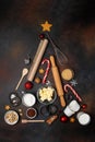 Christmas or New Year baking background. Abstract christmas tree made from baking tools and food ingredients for baking. Royalty Free Stock Photo
