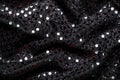 Christmas New Year Black and Silver Glitter background. Holiday abstract texture fabric Royalty Free Stock Photo