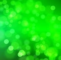 Christmas and New Year bokeh light holiday background. Abstract bokeh light on green color background. Royalty Free Stock Photo