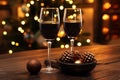 Christmas and New Year celebration champagne and black chocolate candies, mandarines, oranges, toasting on beautiful