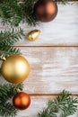 Christmas or New Year composition. Decorations, box, balls, fir and spruce branches, cup of coffee, on a white wooden background. Royalty Free Stock Photo