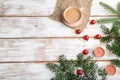 Christmas or New Year composition. Decorations, red balls, fir and spruce branches, on a white wooden background. Top view, copy Royalty Free Stock Photo