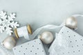 Christmas New Year Composition Gift Boxes White Silk Curled Ribbon Snow Flake Ornament Balls on Gray Stone Background Royalty Free Stock Photo