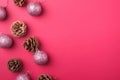 Christmas New Year composition. Gifts, fir tree cones, silver ball decorations on pink background. Winter holidays concept Royalty Free Stock Photo