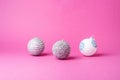 Christmas New Year composition. Gifts, silver and white ball decorations on pink background. Winter holidays concept Royalty Free Stock Photo