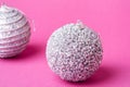 Christmas New Year composition. Gifts, silver and white ball decorations on pink background. Winter holidays concept Royalty Free Stock Photo