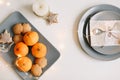 Christmas and New Year composition. tangerines, ginger cookies. festive table setting. Flat lay, holiday background.