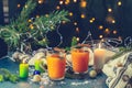 Christmas and New Year composition. Two cup of hot spicy tea with sea buckthorn, cinnamon and star anise, branches of pine and