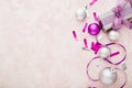 Christmas or New Year composition. Xmas purple and silver decorations: ribbons and balls on pink pastel background. Flat lay, top Royalty Free Stock Photo