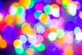 Defocused abstract multicolored bokeh lights background. Blue, purple, green, orange colors. - christmas and new year concept Royalty Free Stock Photo