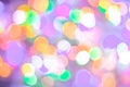 Defocused abstract multicolored bokeh lights background. Blue, purple, green, orange colors. - christmas and new year concept Royalty Free Stock Photo