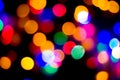 Defocused abstract multicolored bokeh lights background. Blue, purple, green, orange colors. - christmas and new year concept Royalty Free Stock Photo