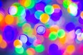 Defocused abstract multicolored bokeh lights background. Blue, purple, green, orange colors. - christmas and new year concept Royalty Free Stock Photo