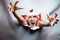 Christmas New Year concept, Stylish Crazy guy santa hat breaks t