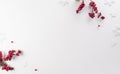 Christmas and new year decoration background concept. Top view of red berry, star and snowflake on white background