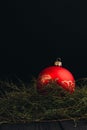 Christmas New Year decoration composition. Top view of fur-tree branches and balls frame on wooden background with place for your Royalty Free Stock Photo