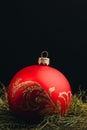 Christmas New Year decoration composition. Top view of fur-tree branches and balls frame on wooden background with place for your Royalty Free Stock Photo