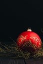 Christmas New Year decoration composition. Top view of fur-tree branches and balls frame on wooden background with place for your Royalty Free Stock Photo