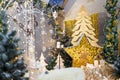 Christmas and New Year decorations with clock, fir tree, branches, bulbs, stars and warm sparlking garland lights. Winter magic Royalty Free Stock Photo