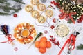 Christmas New Year dishes 2024, traditional festive olivier salad and cheese with cherry tomatoes, grapes and honey with fir