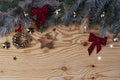 Christmas New Year eve background with fir tree and decoration on light wooden board Royalty Free Stock Photo