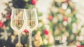 Christmas and new year eve party with champagne and blurred background ornament decorated tree Royalty Free Stock Photo