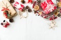 Christmas and new year flat lay decor with wreath and gift box on white backround Royalty Free Stock Photo