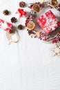 Christmas and new year flat lay decor with wreath and gift box on white backround Royalty Free Stock Photo