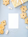 Winter holiday frame with gingerbread biscuits. Royalty Free Stock Photo