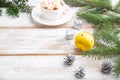 Christmas or New Year frame composition. Decorations, balls, cones, fir and spruce branches, on a white wooden background. Side Royalty Free Stock Photo