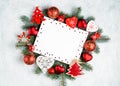 christmas or new year frame composition. christmas decorations in red colors on white background with empty copy space for text. Royalty Free Stock Photo