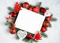 christmas or new year frame composition. christmas decorations in red colors on white background with empty copy space for text. Royalty Free Stock Photo