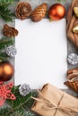 Christmas or New Year frame composition, template. Decorations, cones, fir and spruce branches, cup of coffee, on a gray concrete Royalty Free Stock Photo