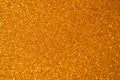 Christmas New Year Gold Glitter background. Holiday abstract texture fabric Royalty Free Stock Photo