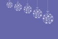 Christmas and New Year greeting card, baubles of white snowflakes on purple background Royalty Free Stock Photo