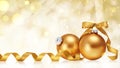 Christmas and New Year greeting card. Holiday ornament, winter decoration. Golden christmas baubles with ribbon bow over bokeh Royalty Free Stock Photo