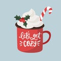 Christmas, New Year greeting card, invitation. Handwritten Lets get cozy text. Hand drawn cup of hot chocolate or coffee