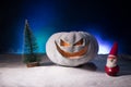 Christmas New Year or Halloween Celebrate Background with Little Christmas Tree on Blurred Bokeh Snow Background with horror Royalty Free Stock Photo