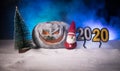 Christmas New Year or Halloween Celebrate Background with Little Christmas Tree on Blurred Bokeh Snow Background with horror Royalty Free Stock Photo